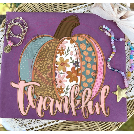 Thankful Pumpkin design shown on a shirt, offered as tee, long sleeve or sweatshirt