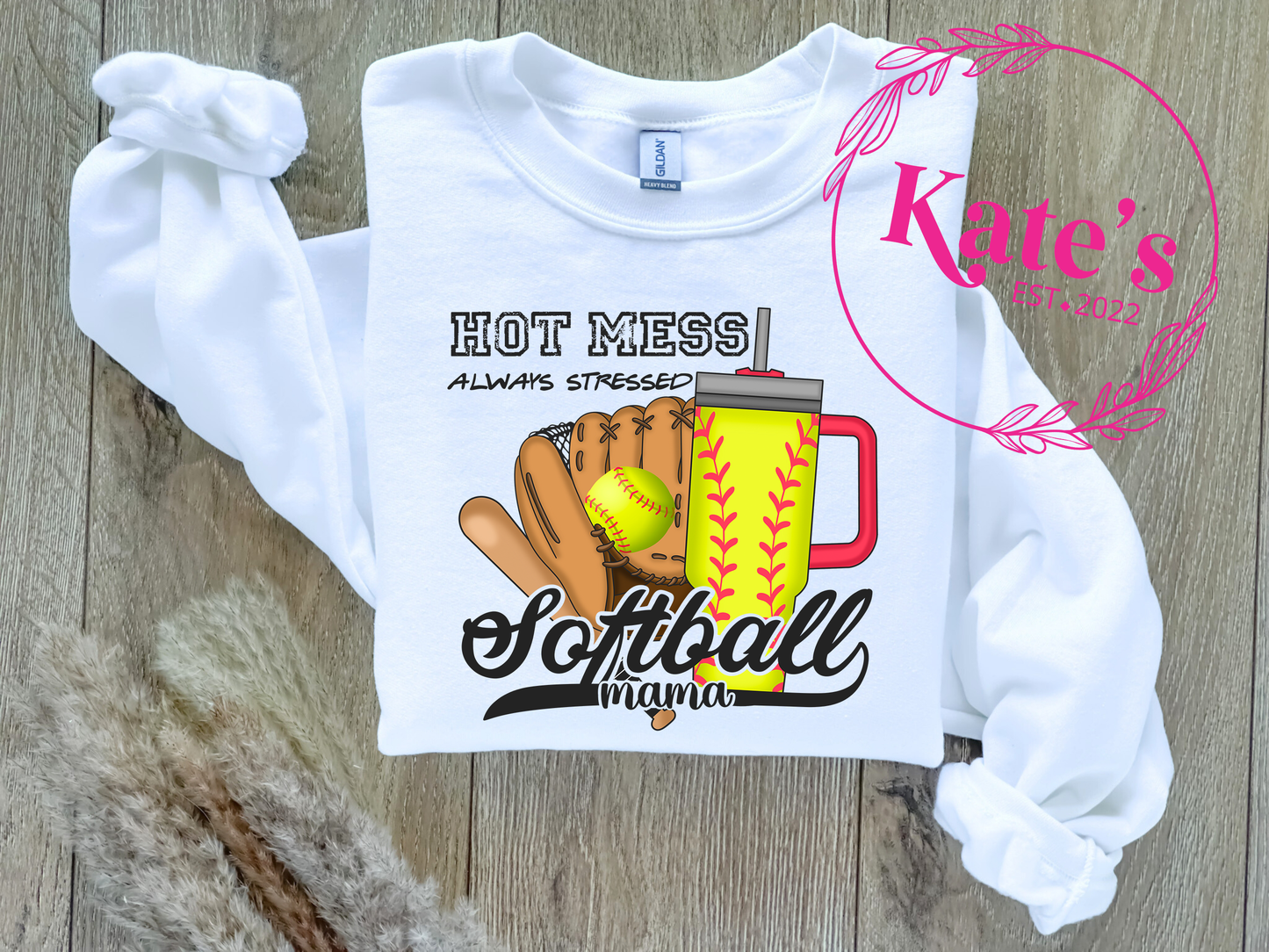 a t - shirt with a baseball glove and ball on it