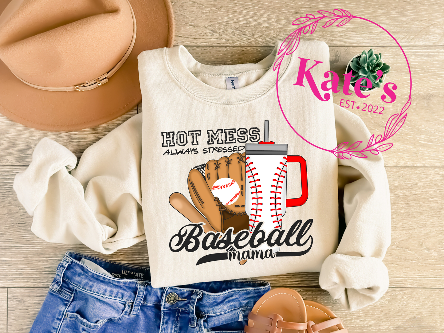 a t - shirt with a baseball and a baseball glove on it